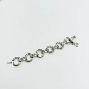 Vintage Silver Tone Link Bracelet with Engraved Scroll Pattern and Clasp